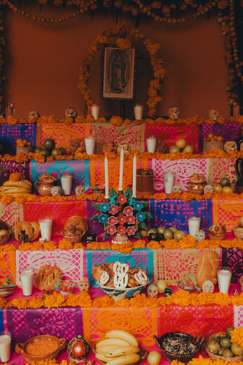 Photo by Chris Luengas a table topped with lots of food and candles