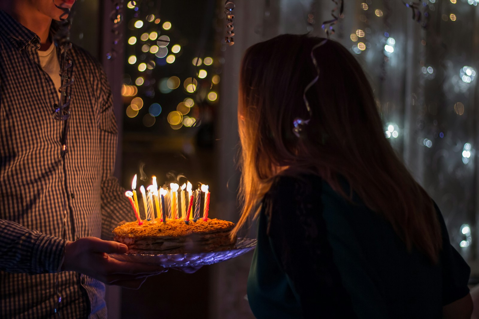 photo of birthday birth about to blow birthday candles